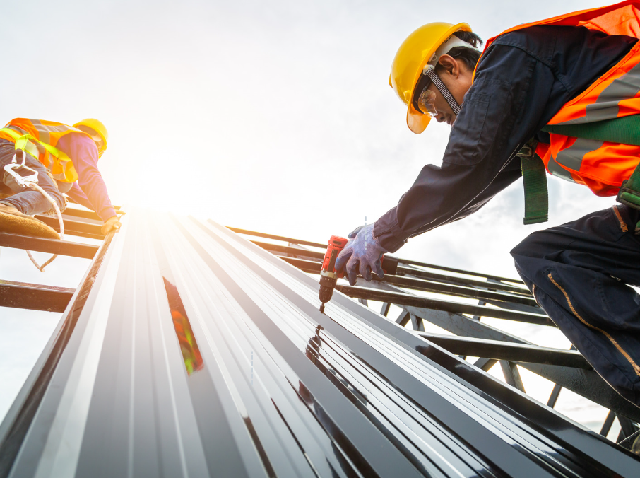 Two workers wearing hard hats